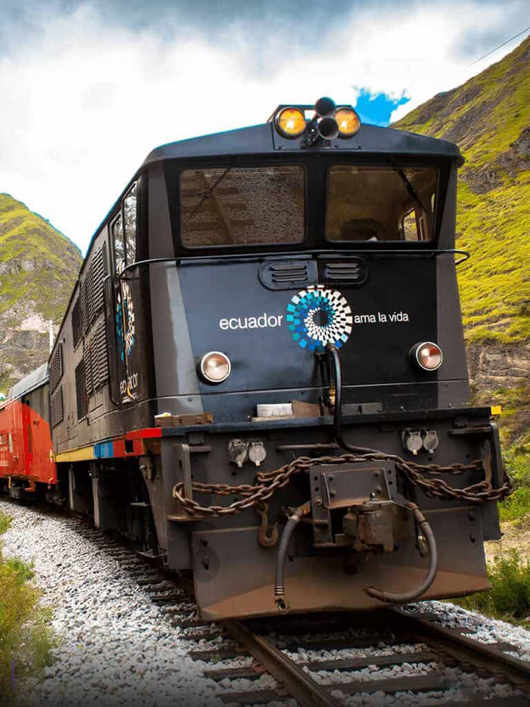 Ecuador tourist train traveling through mountain landscape